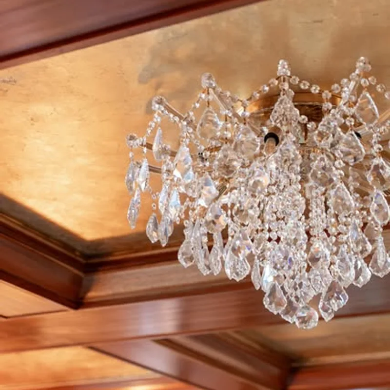 Instagram reel from 2026-09-11: Image of lighting, woodwork, chandelier and text.